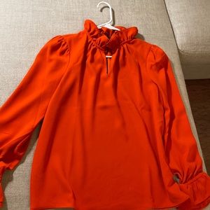 J crew small orange blouse with ruffle neck and cuff detail
